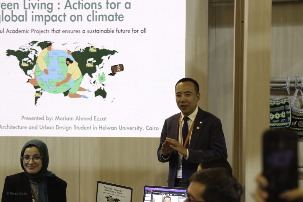 Mr. Yigang Li introduces the Afri-City Lab in the Climate Resilient Livelihood session. (c) Momen Ghonim